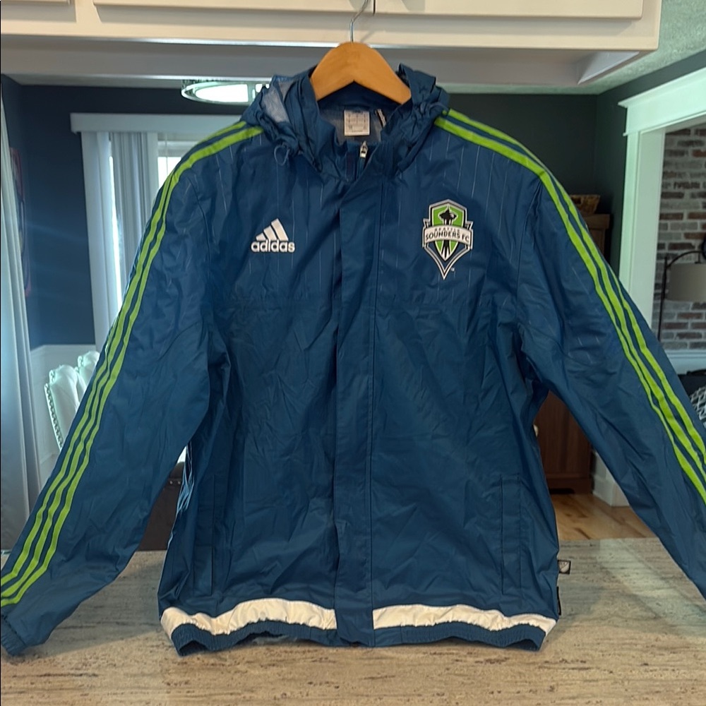 Adidas Men’s Seattle Sounders Blue Raincoat with Green Stripes